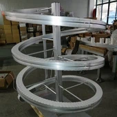 Transportador de barrena de cargol flexible